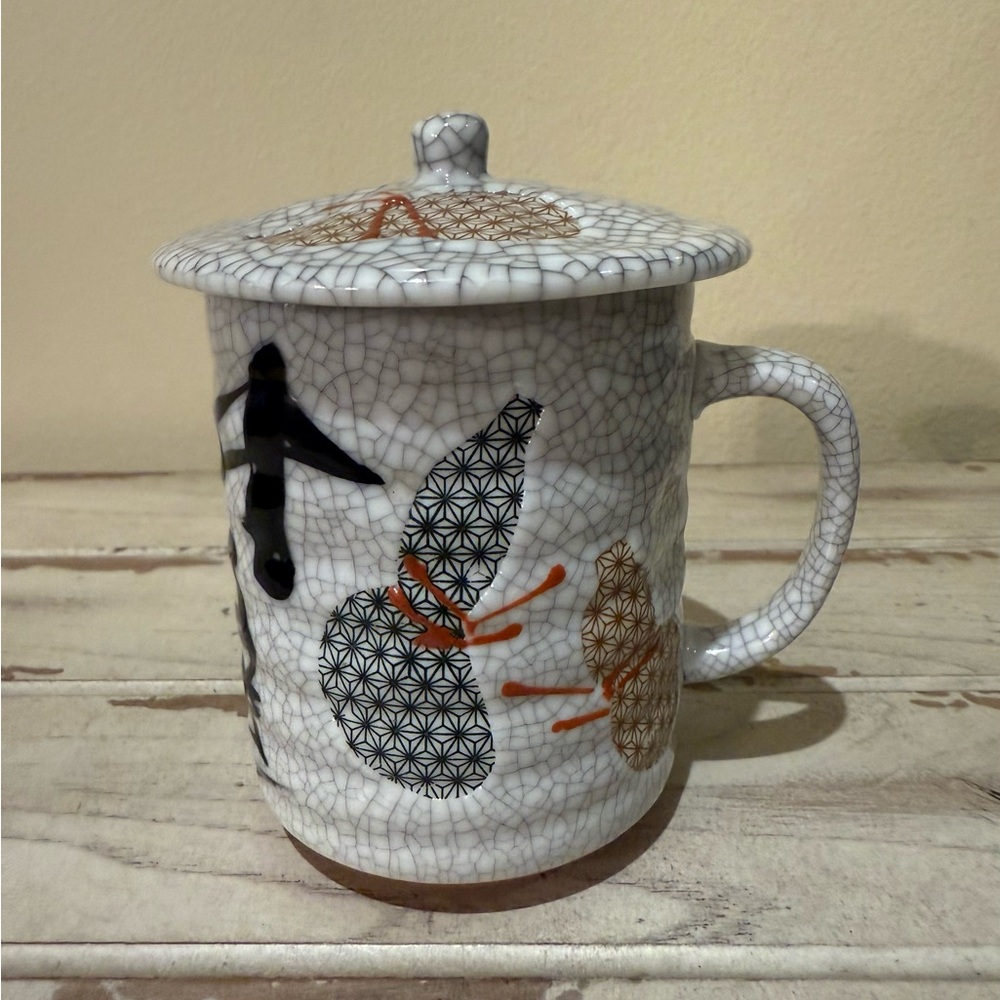 Kotobuki Crackle Glaze Ceramic Mug with Lid - Black, Orange, and Brown Design